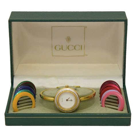 Gucci watch with changeable bezels